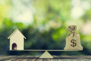Money and home,loan,mortgage. Change home into cash concept.